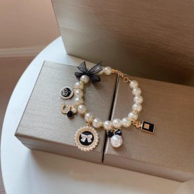Chanel stílusú csipke masnis gyöngy nyaklánc